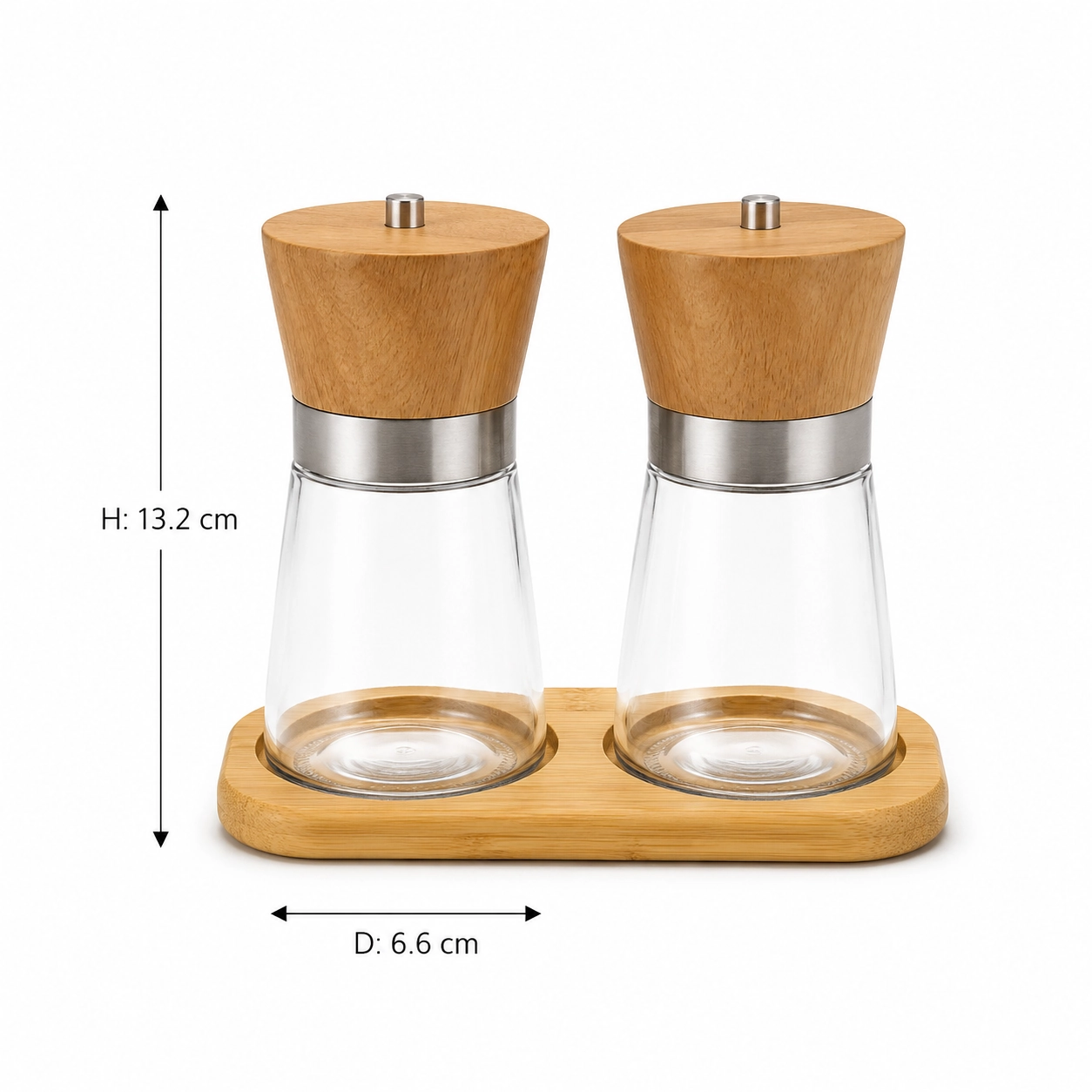 Two glass spice grinders with bamboo tops and a matching bamboo tray